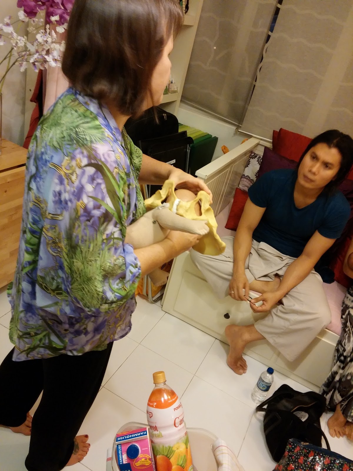 Spinning Babies <p>Our Guest Blog Story comes to us from the mother, Jes, who experienced this birth.
“Is Dr. Martin on call?”
One hundred and ten hours into labor, my confidence was waning.
“No, Dr. Martin won’t be in until Tuesday.”
It was Thursday. I’d been in labor since the previous Saturday, and for all of that work (without so much as a half an hour of sleep) I had gained just 6cm. However, I knew that with all of the things I’d want done a certain way, I’d need my own doctor in order to be comfortable with a cesarean. With that option no longer a possibility, I was desperate to figure out what was holding my baby up, literally.
But in both my labors, I had done every Spinning Babies recommendation I could think of. Again, and again. Not only in labor, but also for months beforehand. I had also done Chiropractic adjustments. And acupuncture. And Dynamic Body Balancing.
At 117 hours into my second labor, here I was, a VBAC, desperate to find a way out.
I called Gail Tully.
I had first met Gail Tully at a conference two years earlier. At that conference, I told her how, despite all of my efforts and exercises, my first birth ended in a Cesarean after 34 hours at 7cm with no progress. Gail had mentioned during her lecture that Spinning Babies maneuvers, when done faithfully, would help most women. But, for some, labor would just click and everything would flow beautifully. As a doula, I’d seen it happen—side-lying release really is magic. For other women, the same maneuvers would allow them to just barely avoid a cesarean—it would still be long and difficult.
After carefully asking questions, Gail suspected that the problem area for me was likely my sacrotuberous ligament. Looking up from the bottom or outlet, of the pelvis we see the sacrotuberus ligament (with the ischiococcygeal ligament) connecting the sacrum to the sitz bones (those you sit on when you sit up). When spasming they shorten. Matthew Duncan, OB, wrote that short sciatic ligaments are short they reduce the room in the pelvic outlet. (same ones, but his name notes their location by the sciatic notch and nerve) Tip: Babies are often engaged earlier than usual and long before labor begins because the inlet of the pelvis is significantly opened by the closing of the outlet.</p>
A ligament of the sacroiliac joint, the sacrotuberous attaches the posterior sacrum and upper coccyx to the ischial tuberosities on either side of the body.
<p>This fan-shaped ligament also blends with the posterior sacroiliac ligaments to attach to the posterior superior iliac spines, creating strong stability for the sacrum and preventing its movement under body weight. (Confused? Check out this interactive anatomy link for clarity.)
Ideally, the sacrotuberous ligament is slender enough that it cannot be externally palpated. However, when the ligament is stressed, usually by aggressive physical activity or injury, it can become thick and tight. This can cause a number of issues, including ossification of the ligament and pressure on the pundendal nerve; but the main difficulty for pregnant and laboring women is the shortening of the ligament, which in turn pulls the coccyx and the ischial tuberosity closer together.</p>
Besides causing substantial positioning issues for any baby trying to get into that pelvis, the tightening essentially closes off the outlet to some degree, causing long labor by not allowing the baby to pass. <p>Gail shows a Dad (Mom is just out of view) how a chronically spasming sacrotuberous ligament draws the pelvic outlet closed and because midwives and doctors are often unaware of this possible cause of labor dystocia, the mother has a cesarean to finish the birth.
I remembered when we talked at that conference two years previous, Gail had palpated my sacrotuberous ligaments. On my left the ligament was as thick as a pencil and the space between my coccyx and ischial tuberosity was much shorter than normal. Not surprisingly, I’ve had issues with my hip on my left side, and my left leg is shorter than my right, indicating a tightness that chiropractic adjustment would remedy, only to have it return.
So when we spoke 117 hours into my second labor, I began to understand that the possibility of the sacrotuberous ligament was the culprit in this, my second and incredibly long labor.
After our conversation, I called a physical therapist who agreed to come over and stretch the ligament. Her work on me included testing me for what Physical Therapists refer to as a pelvic upslip (sure enough, I had every sign of one) and treating me for that. After an hour of bodywork for the upslip with a specific focus on stretching the sacrotuberous ligament, labor came on fast and furious, and within a couple of hours, I was 10cm and pushing.</p>
The sacrotuberous ligament should be considered if any of the following apply: A long and difficult labor in which normal remedies (Rebozo Sifting, Position Changes, Spinning Babies Maneuvers) are not fully effective
Persistently malpositioned baby
Highly athletic mother (especially those who are highly athletic into their pregnancy)
History of any trauma in which the ligaments of the pelvis could have been affected (accidents, falls, etc.)
A visible Pelvic Upslip: One (usually left) iliac crest superior to the other, one leg (usually left) functionally shorter than the other. <p>Although I had a physical therapist work on me extremely effectively, it may not be necessary in every case. A simple palpation and gentle stretching of the ligament by the birth practitioner, or by the woman herself, may do the trick. The point here is to stretch the ligament, giving the pelvis it’s natural space and allowing the baby to move freely through it.
Consider the sacrotuberous ligament whenever you’ve exhausted your resources in a slow labor. You just don’t know what you might find.
Jes Mejia is a wife, mom, Certified Professional Midwife, Labor Coach, and Birth Educator. She is the founder of mypeacefulpostpartum.com; a site that gives new and expectant moms the resources and support they need to create their joyful and ideal postpartum experience. Her mission is to help women be fully prepared and supported as they care for themselves and their families through life after childbirth.</p>
Enjoy this post? You also might like: Sacrotuberous Ligament Release
Where OP Babies Get Stuck in Labor and What to Do
Advanced Engagement
Labor Patterns Upcoming Workshops