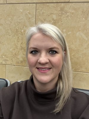 Laura Sessanna Headshot scaled 2 300x400